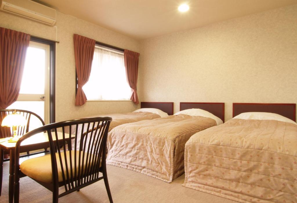 Akakura Yours Inn Myoko Rum bild
